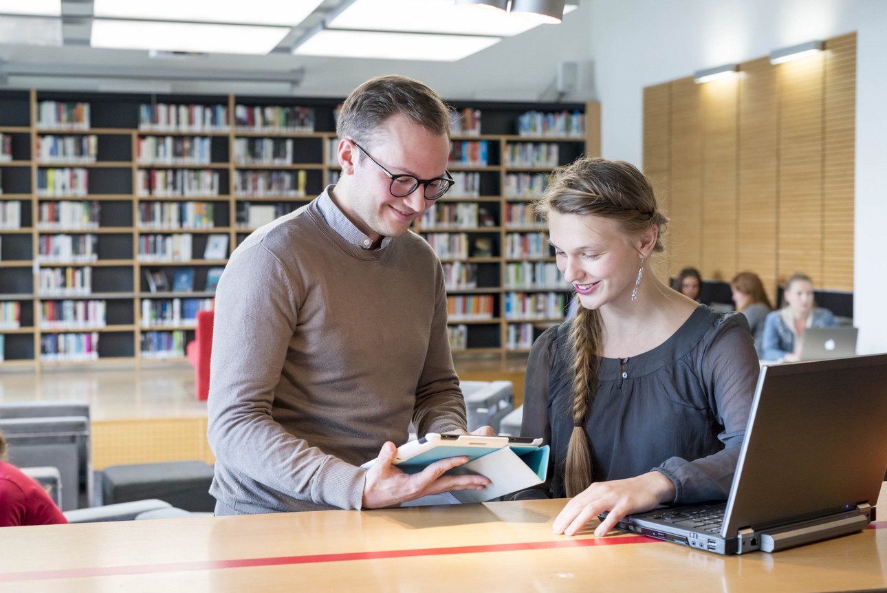 two students in the Library Lounge