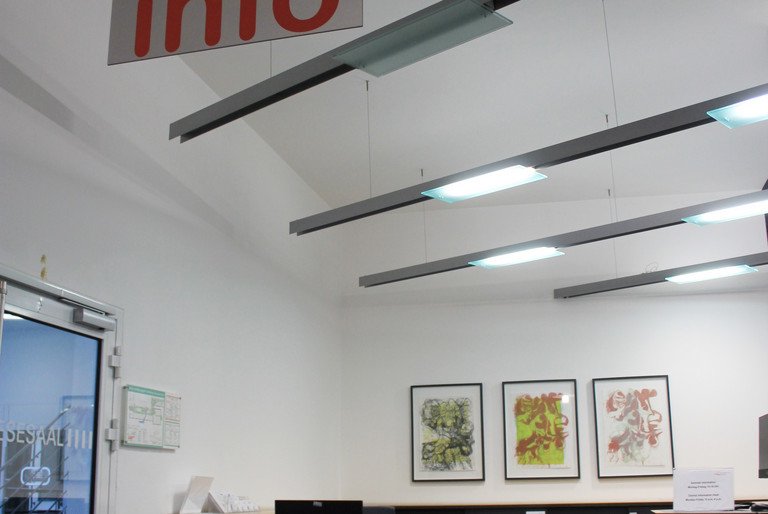 picture of the vacant central information desk at the university library